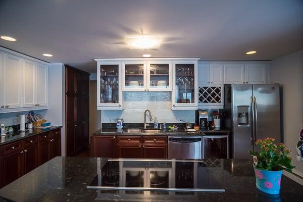 Condo painted upper cabinets & installed new tile backsplash