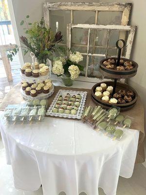 Cupcakes, cakesickles, chocolate covered strawberries and chocolate covered pretzels.