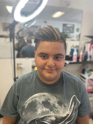 Comb over taper with scissor trim and highlights by reggie