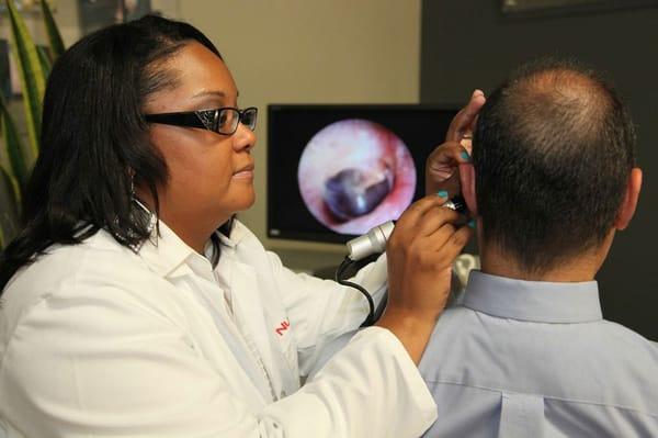 All hearing tests include a painless video otoscope exam. You watch on the TV as the Specialist looks inside your ear canal.