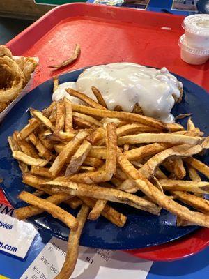 Chicken fried steak and French fries