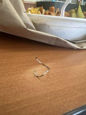 This piece of metal scrubber was in my food