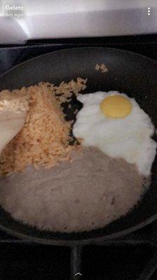 Rice with beans and a sunny side up egg