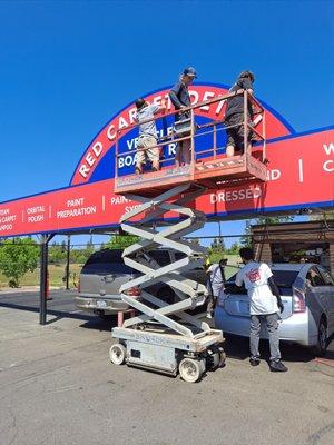 New detail sign at red carpet car wash