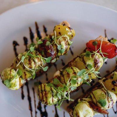 Rosemary Focaccia, Whipped Ricotta, Cherry Tomato, Mozzarella, Freshed Cracked Pepper, Pesto, Balsamic and Microgreens.