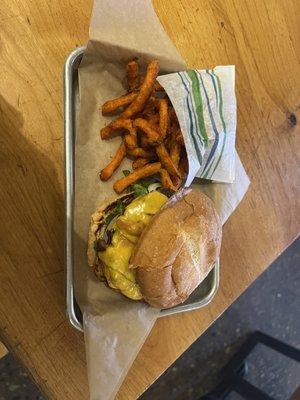 bacon cheeseburger and sweet potato fries.