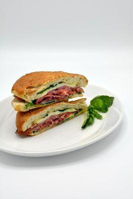 Peppe: Ciabatta Bread, Prosciutto Di Parma, Fresh Mozzarella, Asiago Cheese, Tomatoes, 
 Arugula, Basil, Extra Virgin Olive Oil & Pepper