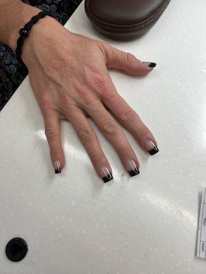 Black-tip French manicure.