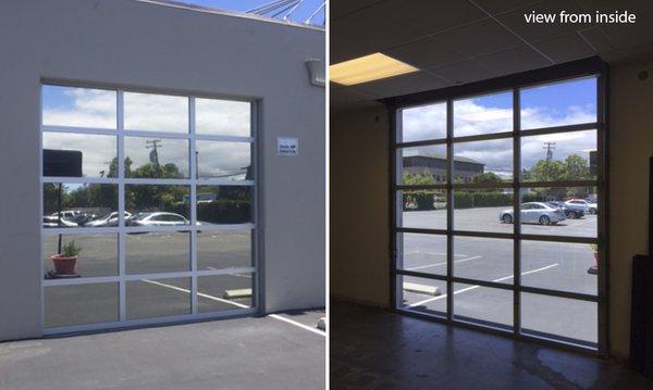 Reflective window film installed to provide heat and UV rejection.