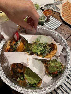 Tacos de Birria, carne asada tacos, and al pastor tacos