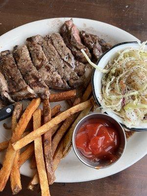 Prime NY Strip with truffle pomme frites and poppyseed coleslaw. Winner!