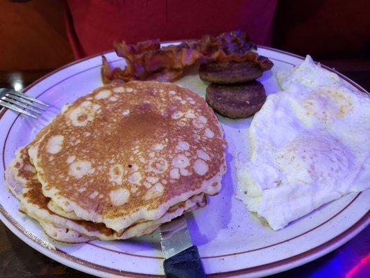 Pancake plate with both bacon and sausage.