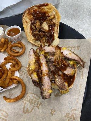 Rib sandwich and curly fries