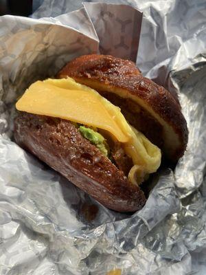 Gluten free DONUT  BREAKFAST EGG SANDWICH  with Avocado  (SHH, I added my own Vegan Spicy Breakfast Sausage Patties)