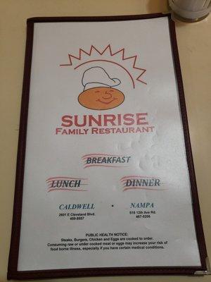 Menu cover, locations and phone numbers.