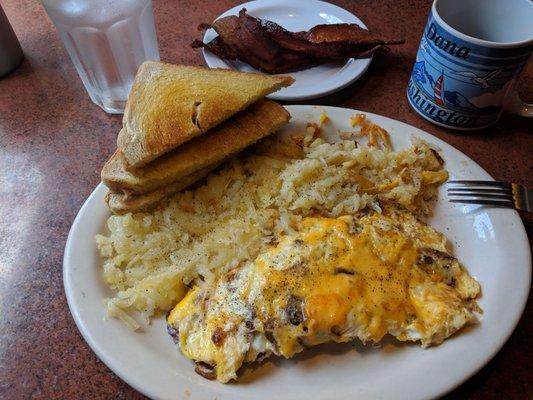 Bacon cheese omlettewith hashbrowns and sourdough