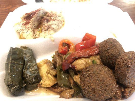 Baba Ghannouj Veggie Platter 3 falafel, 2 grape leaves, choice of salad, baba ghannouj, hummus & cucumber sauce.