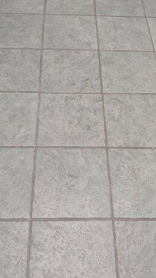 After - Tile and grout cleaning, floor still wet