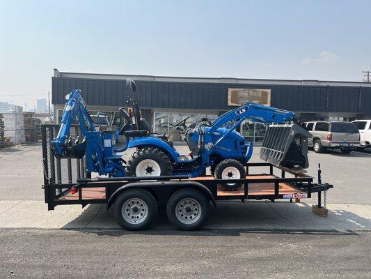 LS XJ2025h on a 14' utility trailer, purchased as a combo.