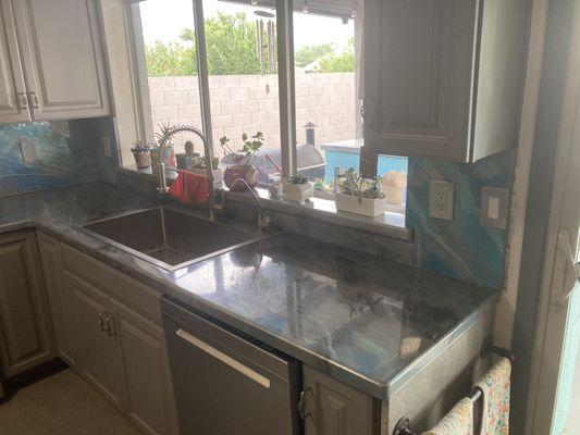 Epoxy Countertop over Granite.