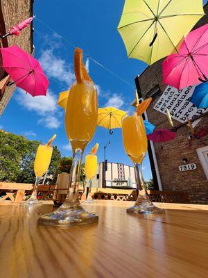 Experience the beauty of our patio this summer as you savor our delightful mimosas and indulge in our authentic Cuban sandwich.