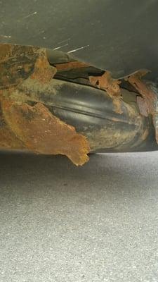 Area where the undercarriage was so rusted the gas tank is protruding through