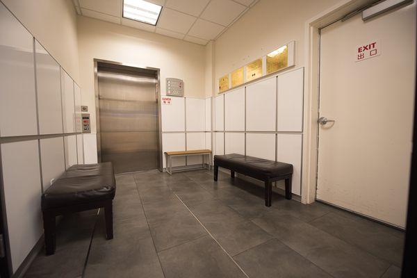 The elevator and door to the stairwell which both reach all levels of our building.