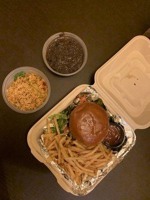 Veggie Burger with sides of Spanish Rice and Vegetarian Black Beans