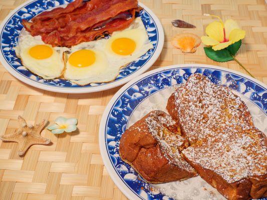 Hawaiian French Toast plate sunnyside up with bacon