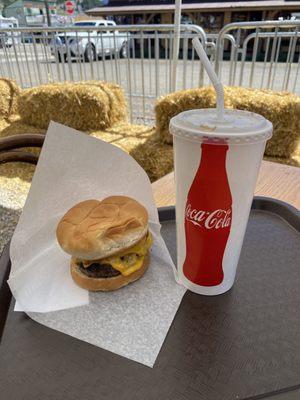 Double cheeseburger with soda