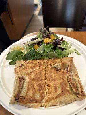 ham and cheese crepe with béchamel sauce and salad with vinaigrette