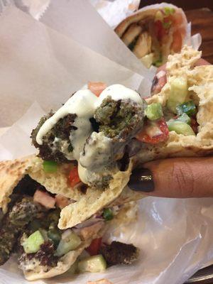 Falafel Sandwich- Pita Bread, Israel Salad, Tahini Sauce ($8.00)