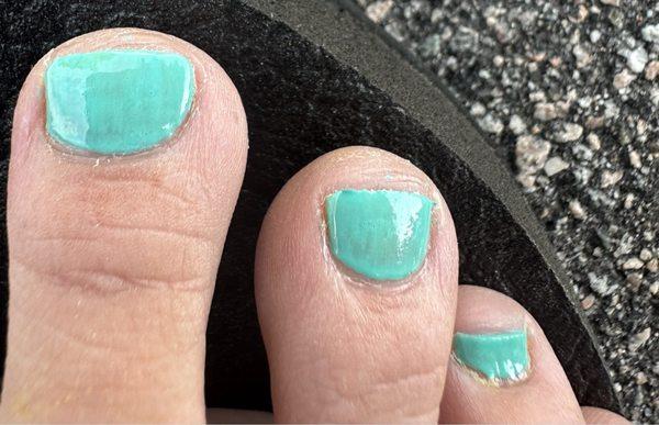 Terrible paint job and pedicure.