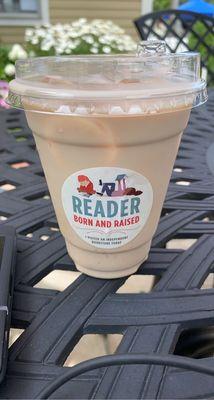 Chai tea latte with an adorable sticker on it