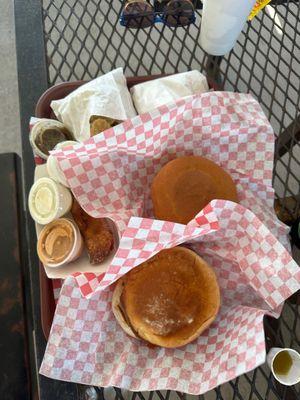 Mushroom swiss burger, Opossum burger, Rattlesnake eggs, fried pickles and french fries and some awesome sauces.