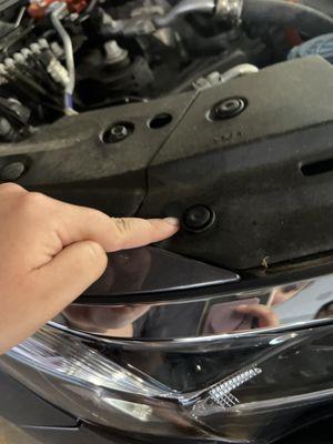 Completely loose screw on an area that they didn't even need to take off to do an oil change