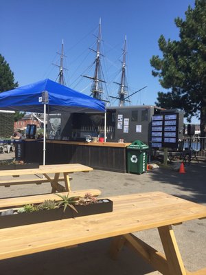 Beer Garden with "Old Ironsides" in the background.