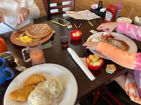 Sausage Biscuit Bonnie and Waffle Deluxe and kids Pancake meal.