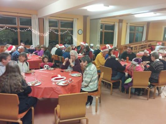 Christmas gift wrapping and family potluck, Foster Hall, December 2013