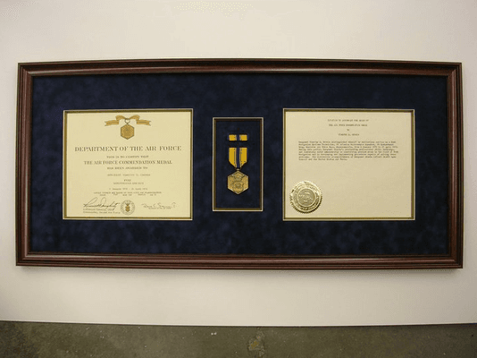 Military award, medal, and letter.