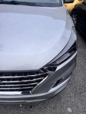 After photo of the large hood dent