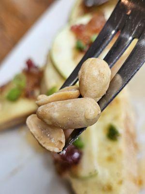 Peanuts on a fork.