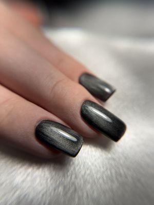 Hard gel manicure with cat eye.