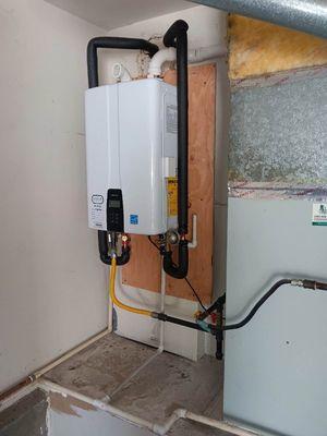 Another professional tankless install
 48 plus experience in plumbing.