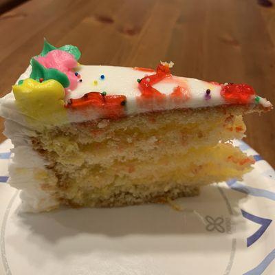 A slice of pineapple 9" Vanilla Cake.