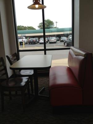 Leather booths and wood chairs