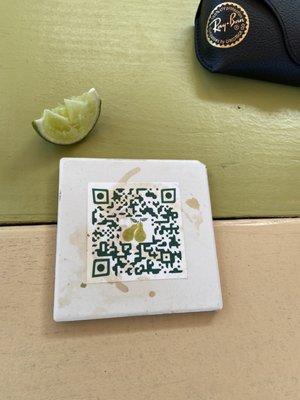 Menus are accessible from QR code coasters on the tables