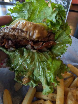 Peanut butter pickled bacon on lettuce wrap