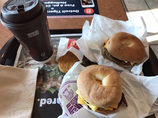 Bacon Egg Cheese Bagel, Sausage Egg Cheese Bagel, Hash Browns, and large Coffee.