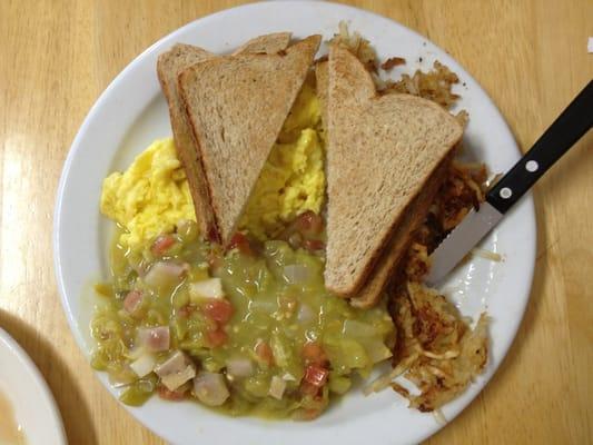 Chicken fried steak - comes with toast, two eggs, and hashbrowns. Added pork green chile. Perfect!